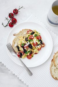Morning scramble with olives, feta and tomatoes